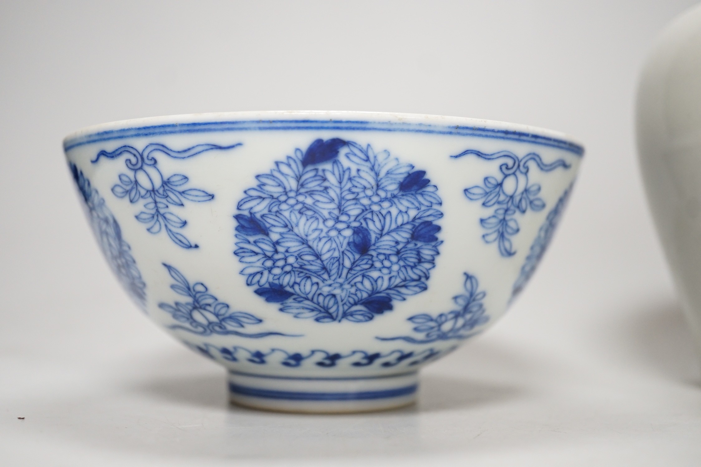 A Chinese underglaze copper red meiping a.f. and a Chinese blue and white bowl. Tallest 15cm